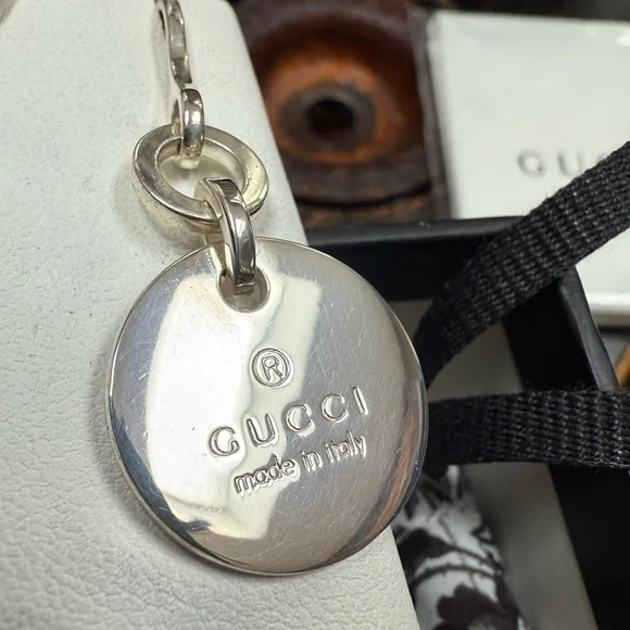 GUCCI Signature Sterling Silver medallion Drop Earrings